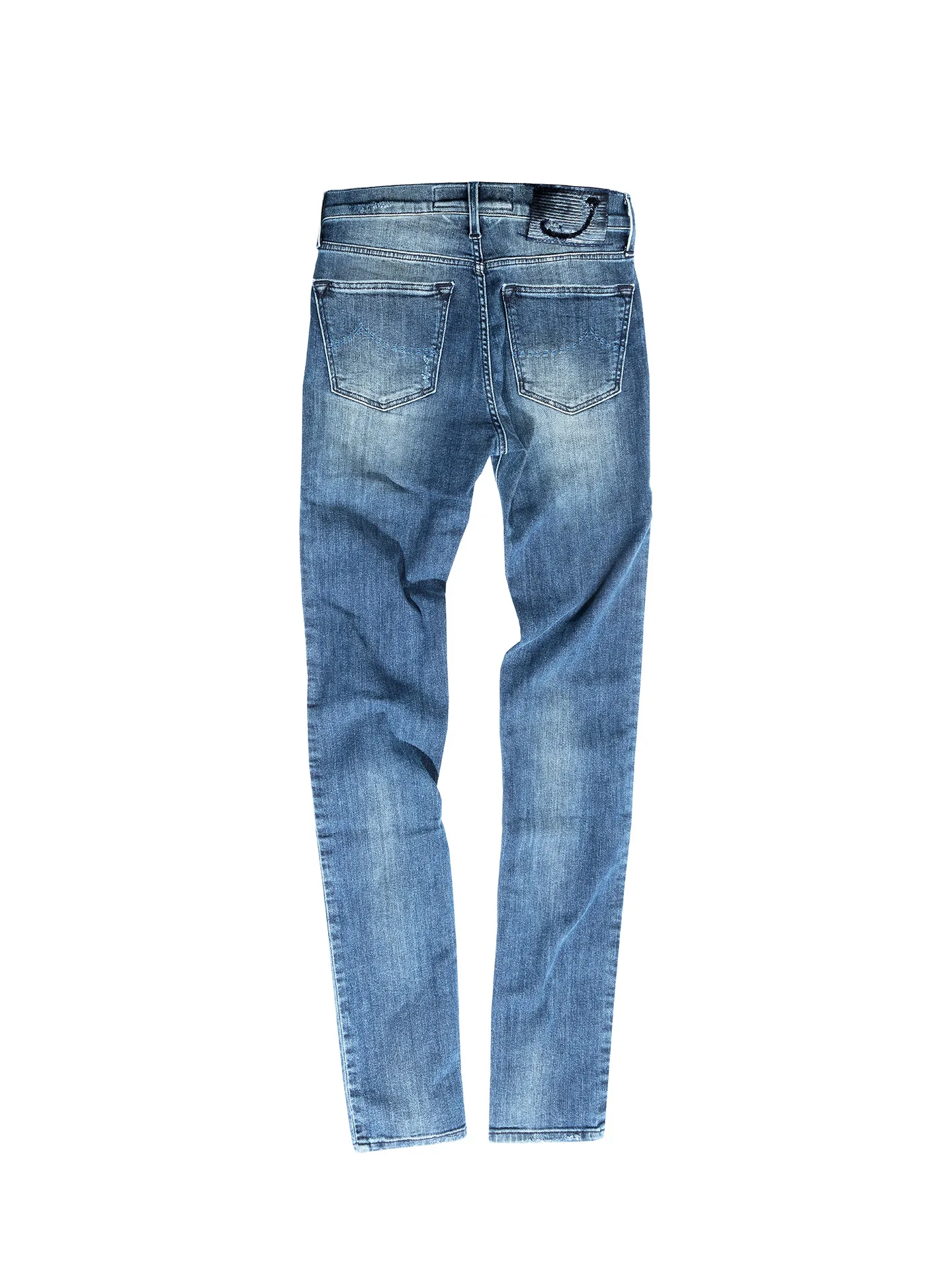 Back view of a pair of Jacob Cohen jeans with rear pockets and embroidered logo on a white background — product still life, Filippo Piantanida Studio